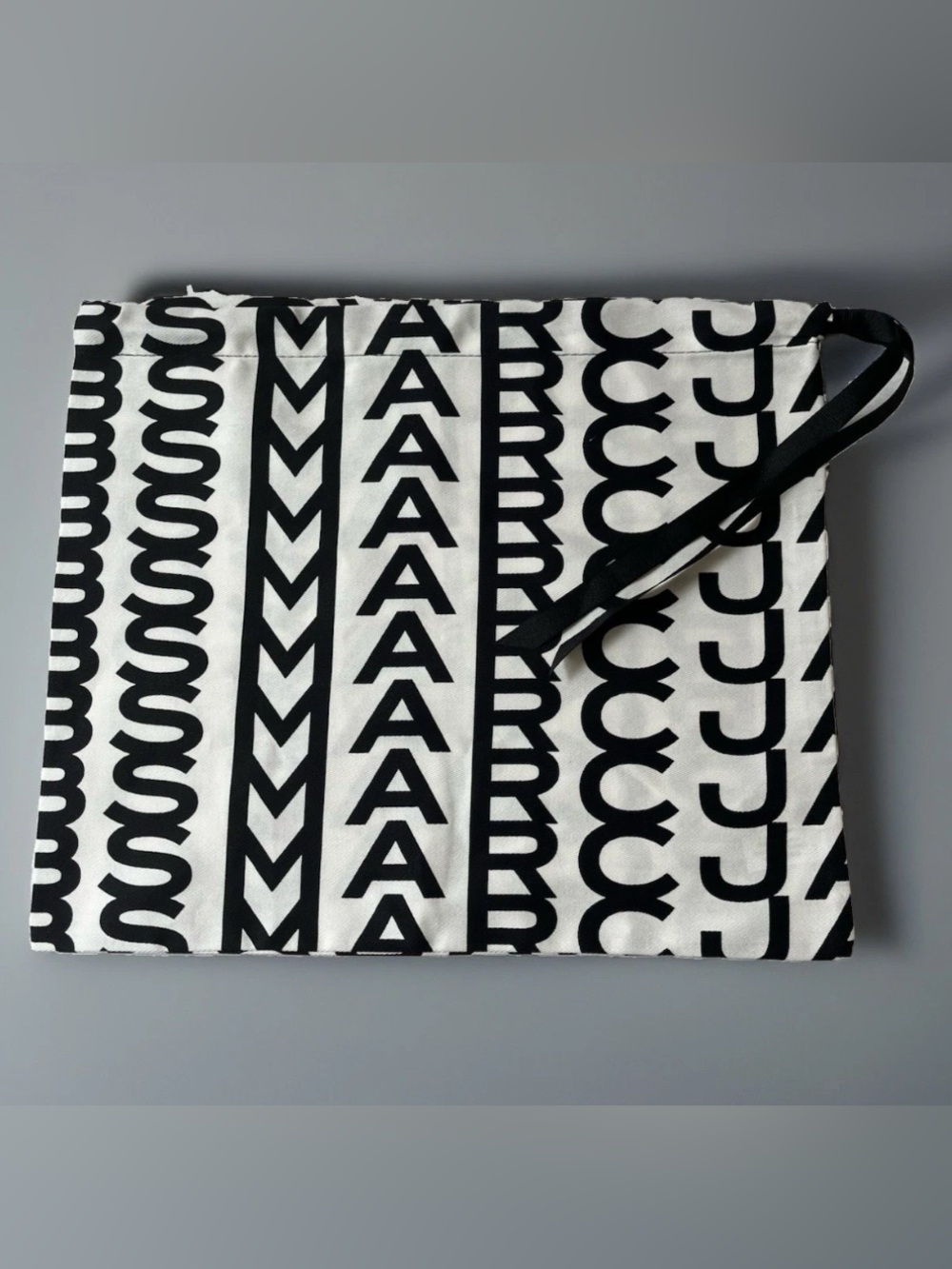 Marc Jacobs Black & White Logo Stripe drawstring dust cover bag 12” x 14”
